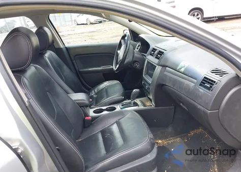 2011 Ford Fusion Hybrid z USA, uszkodzony, nr VIN 3FADP0L33BR126557